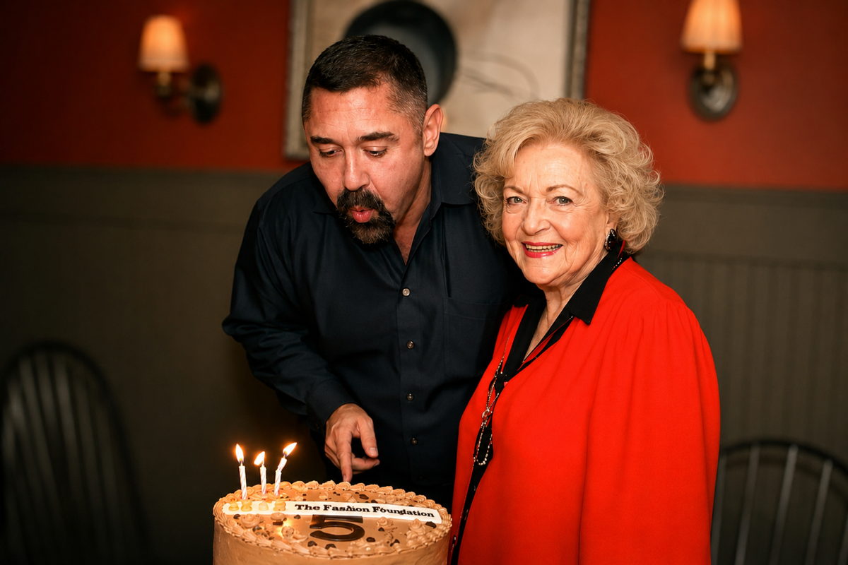 Stephen E. Terrell and Betty White with a cake marking five years of The Lifeline Program campaign, at a private dinner in Atlanta