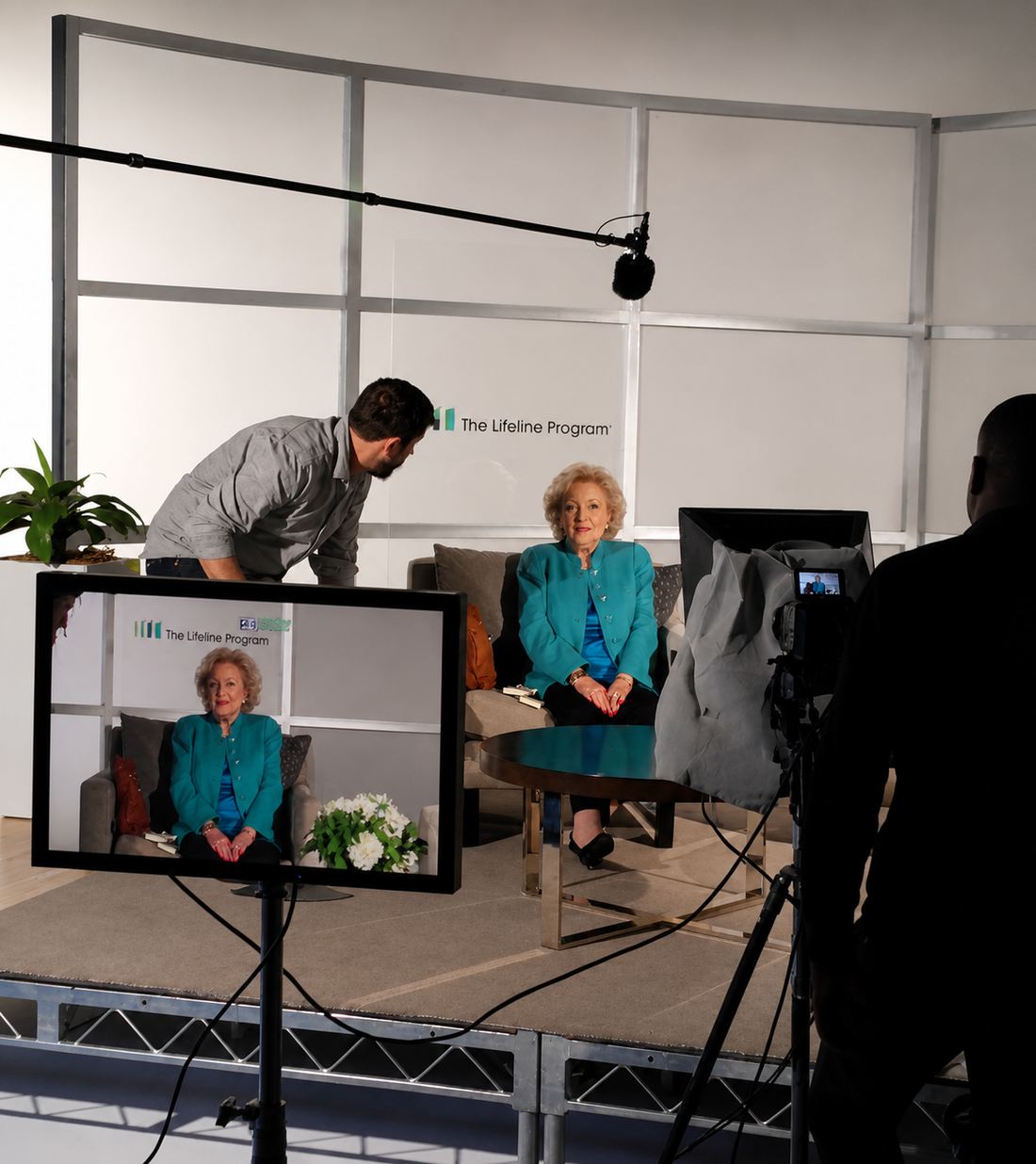 A Lifeline Program training film in production — Betty White on the branded set, boom, camera and monitor, being shot for financial professionals rather than for consumers